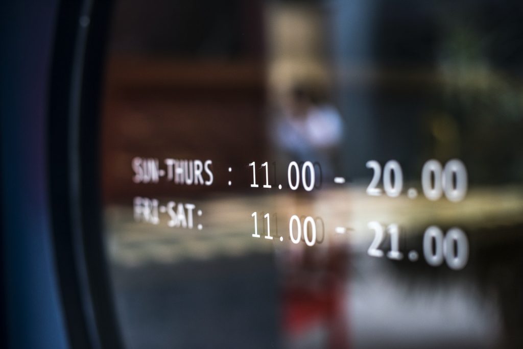Business hours announcement on a window